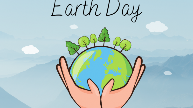 Earth Day - hands holding world with trees
